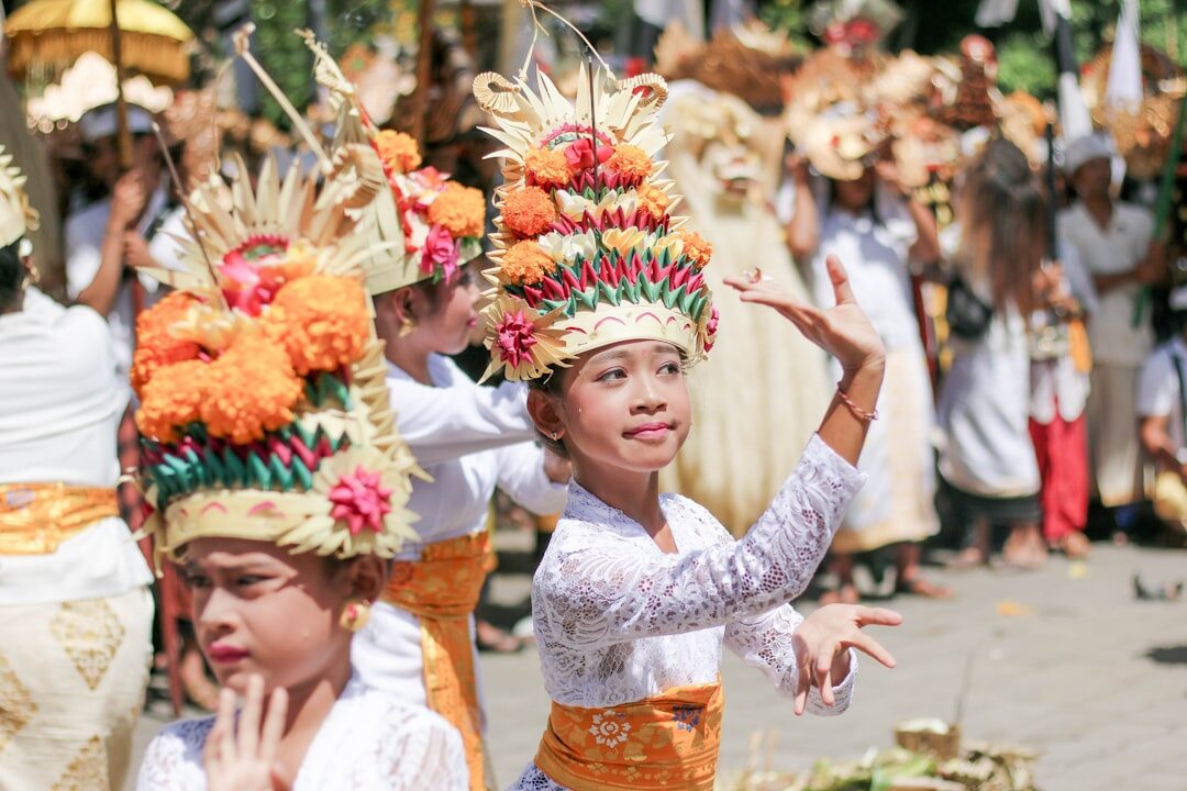 Children in ceremonial dress at a procession. Tap any image for its source and licence.