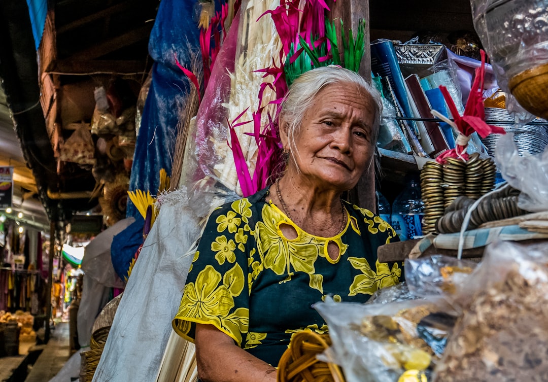 An elderly market vendor in Bali