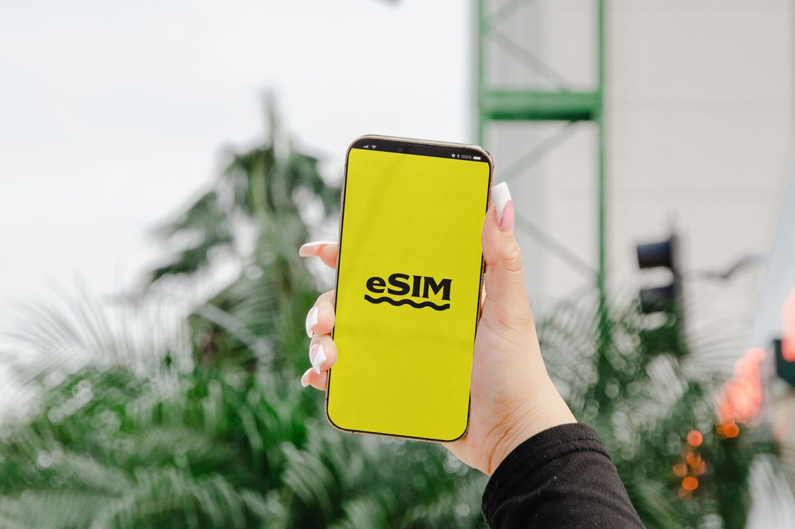 An eSIM is just a data profile you install on the phone before you fly — no plastic card to slot in.