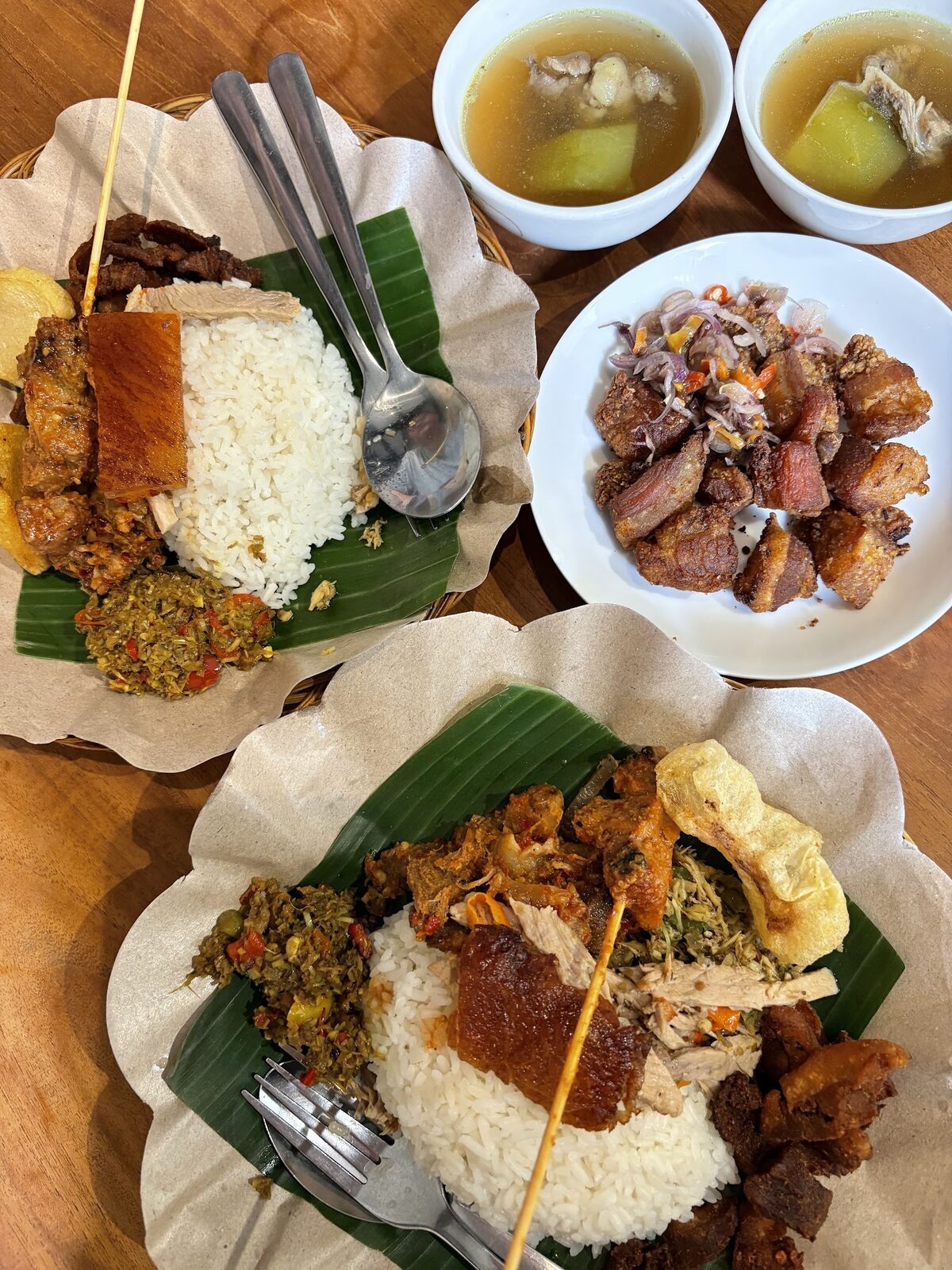 Another nasi campur, this one heavier on the meat, with clear soup on the side.