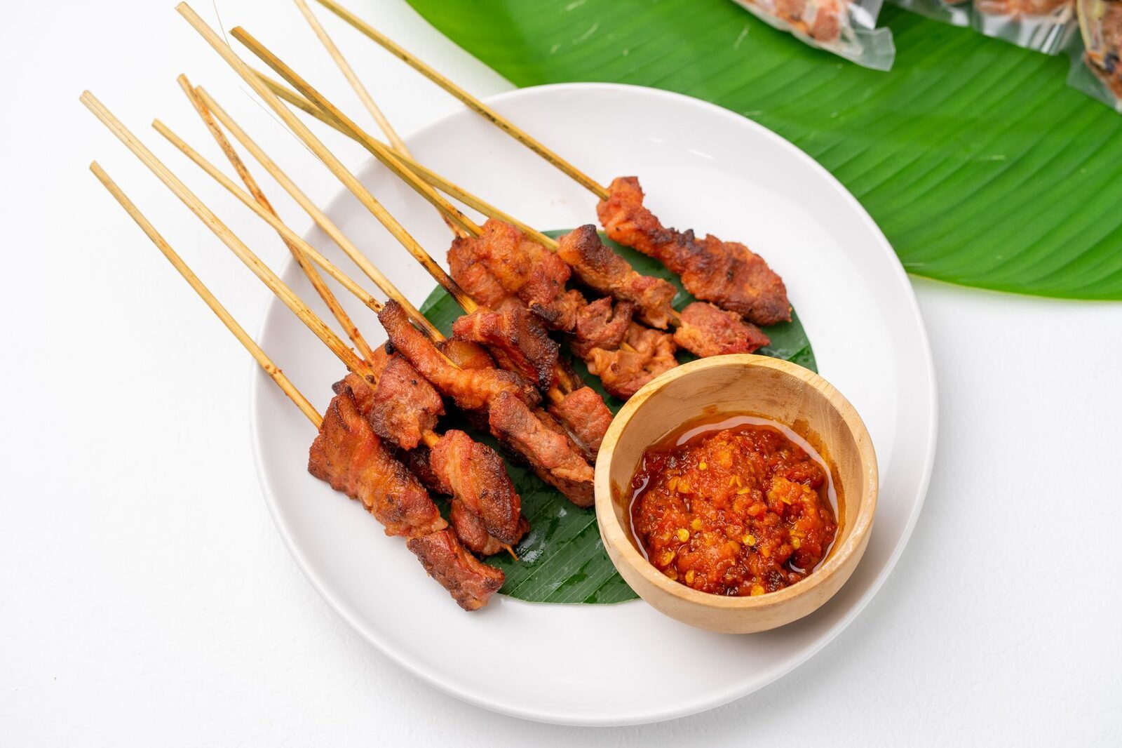 Grilled satay with a fierce sambal on the side.