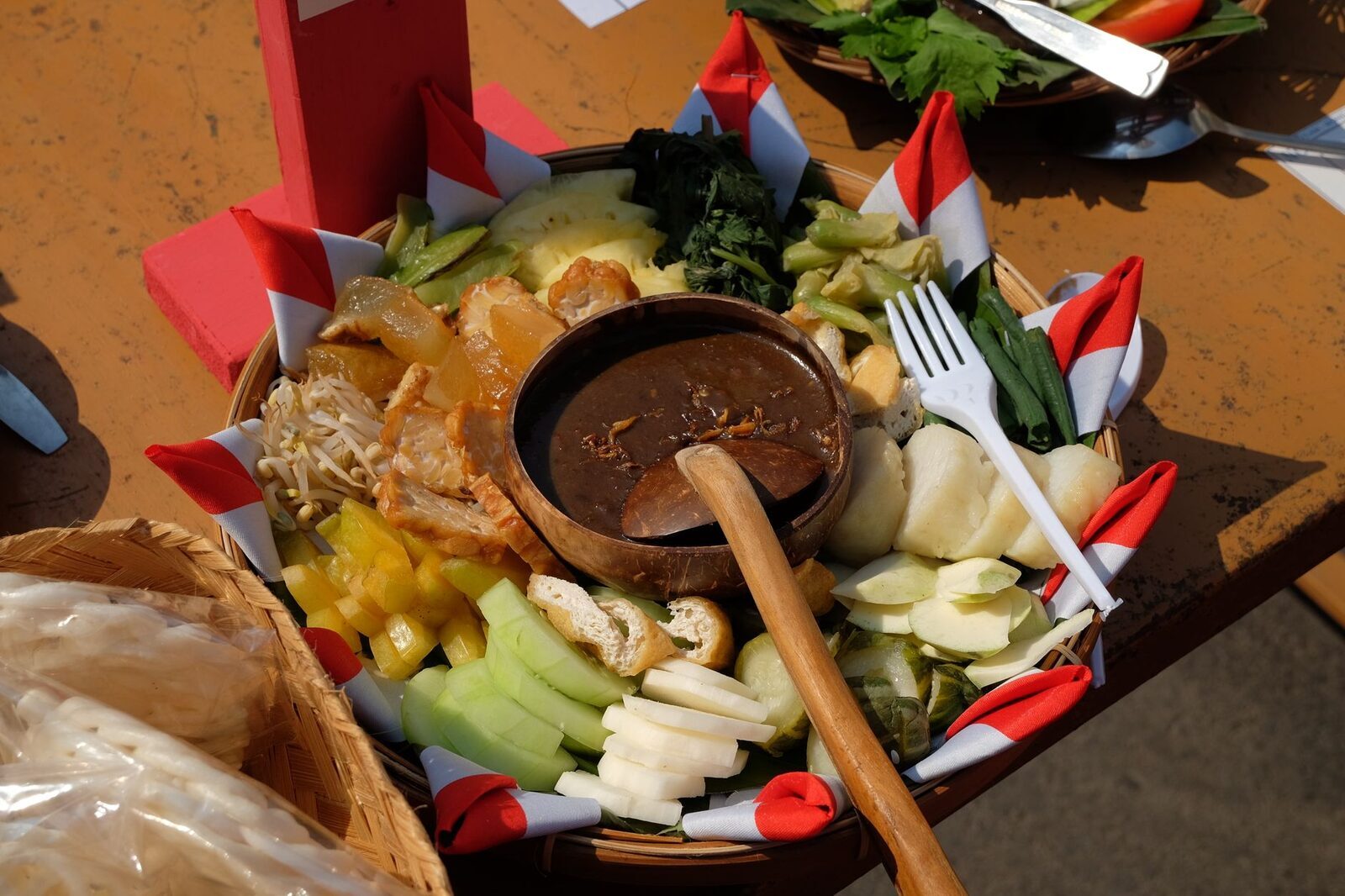 A platter of spiced vegetables, dressed and ready to share.