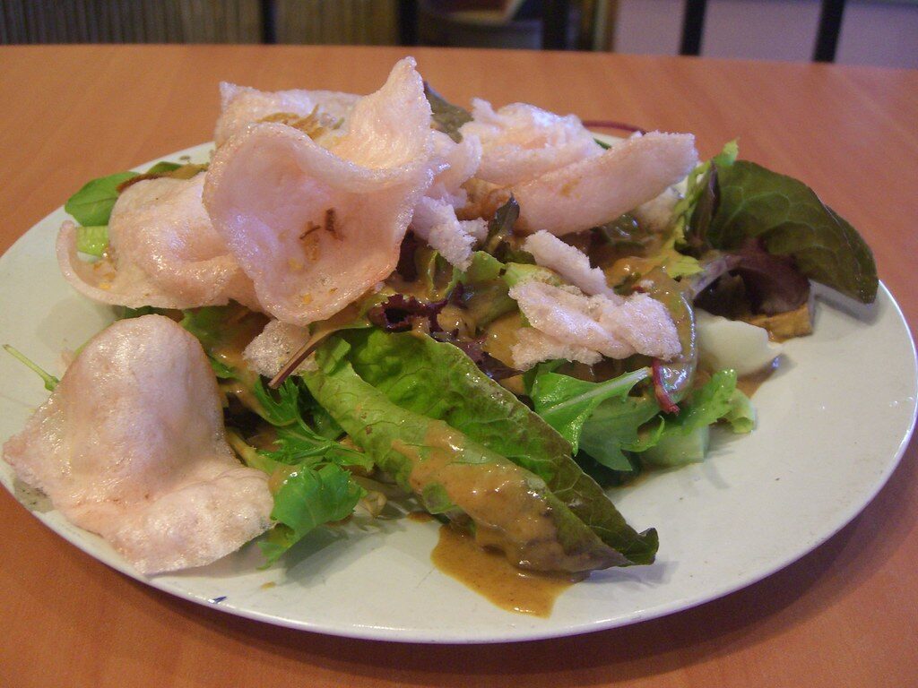 Fresh greens and crackers — simple, and easy to keep meat-free.