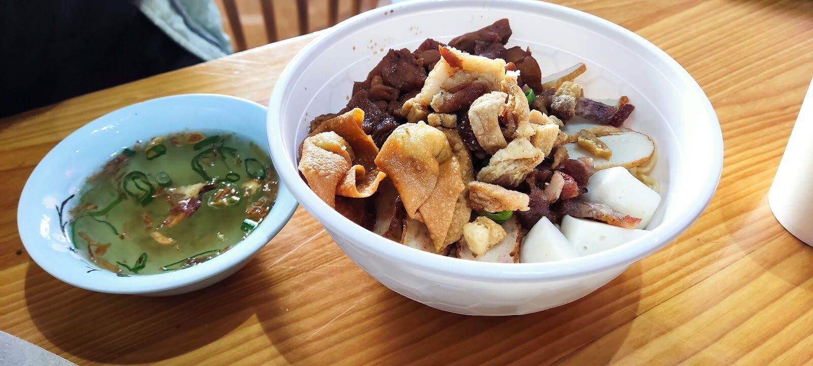 A simple bowl of soup and rice — everyday warung eating.