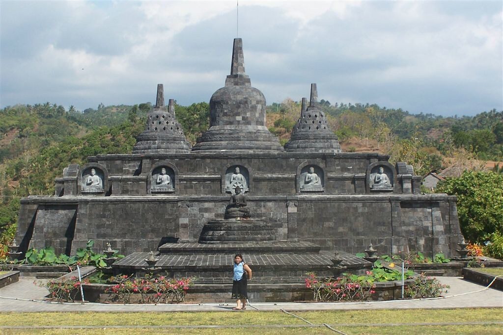 The mini-Borobudur from further back, terraced into the hillside gardens.