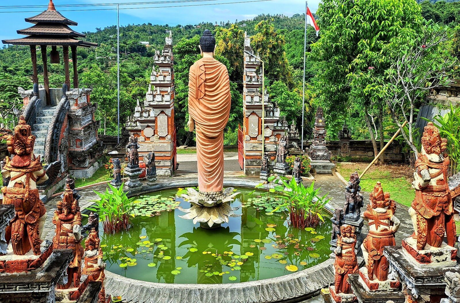 The lotus-pond courtyard with its Buddha and carved guardian figures.