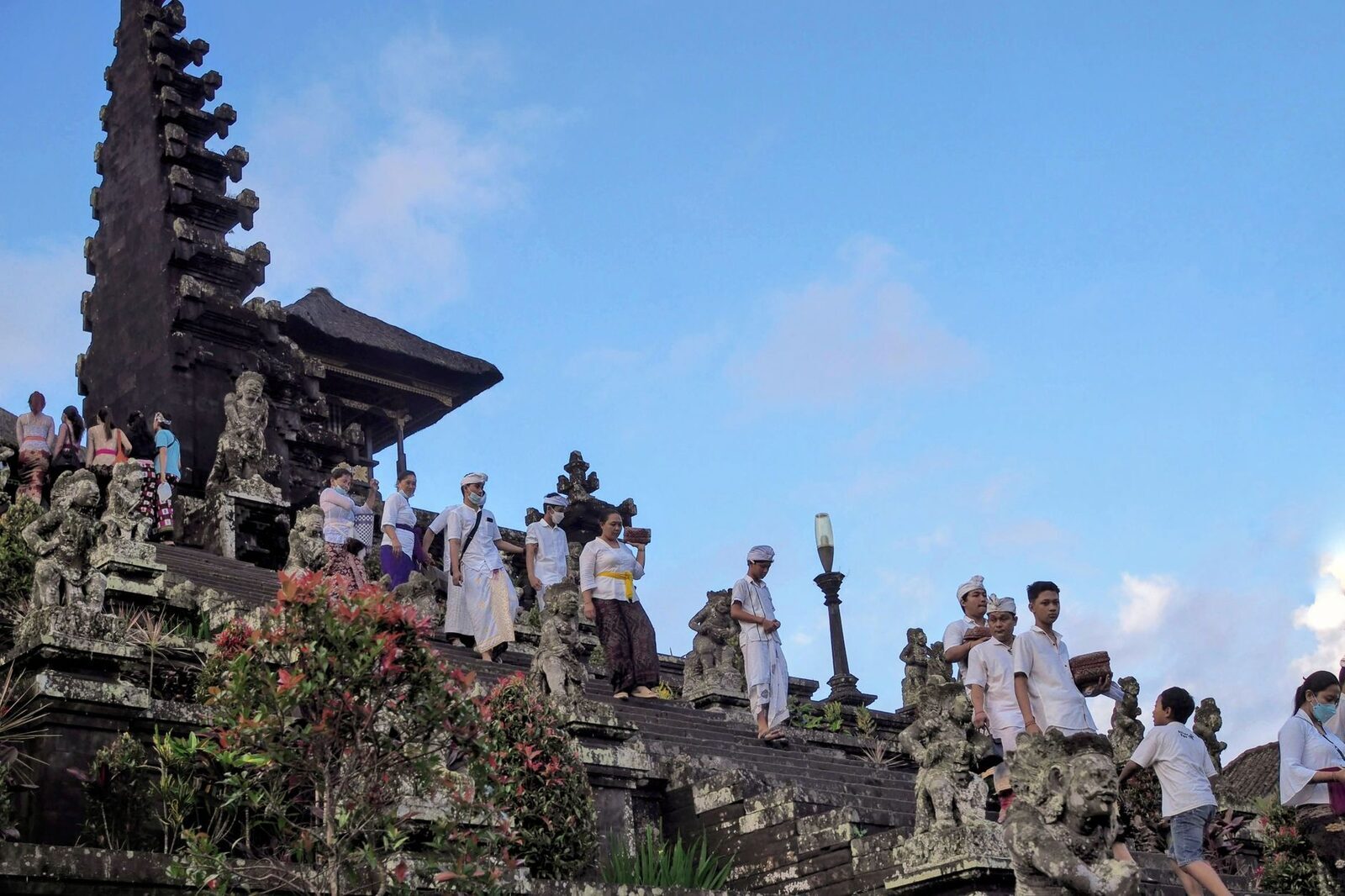 Devotees gathered on Besakih's stone terraces during a ceremony.