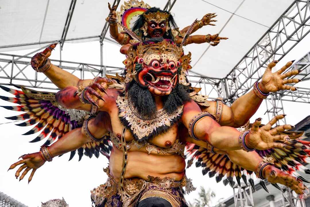 A winged, many-armed effigy — weeks of papier-mache work by the local youth group.