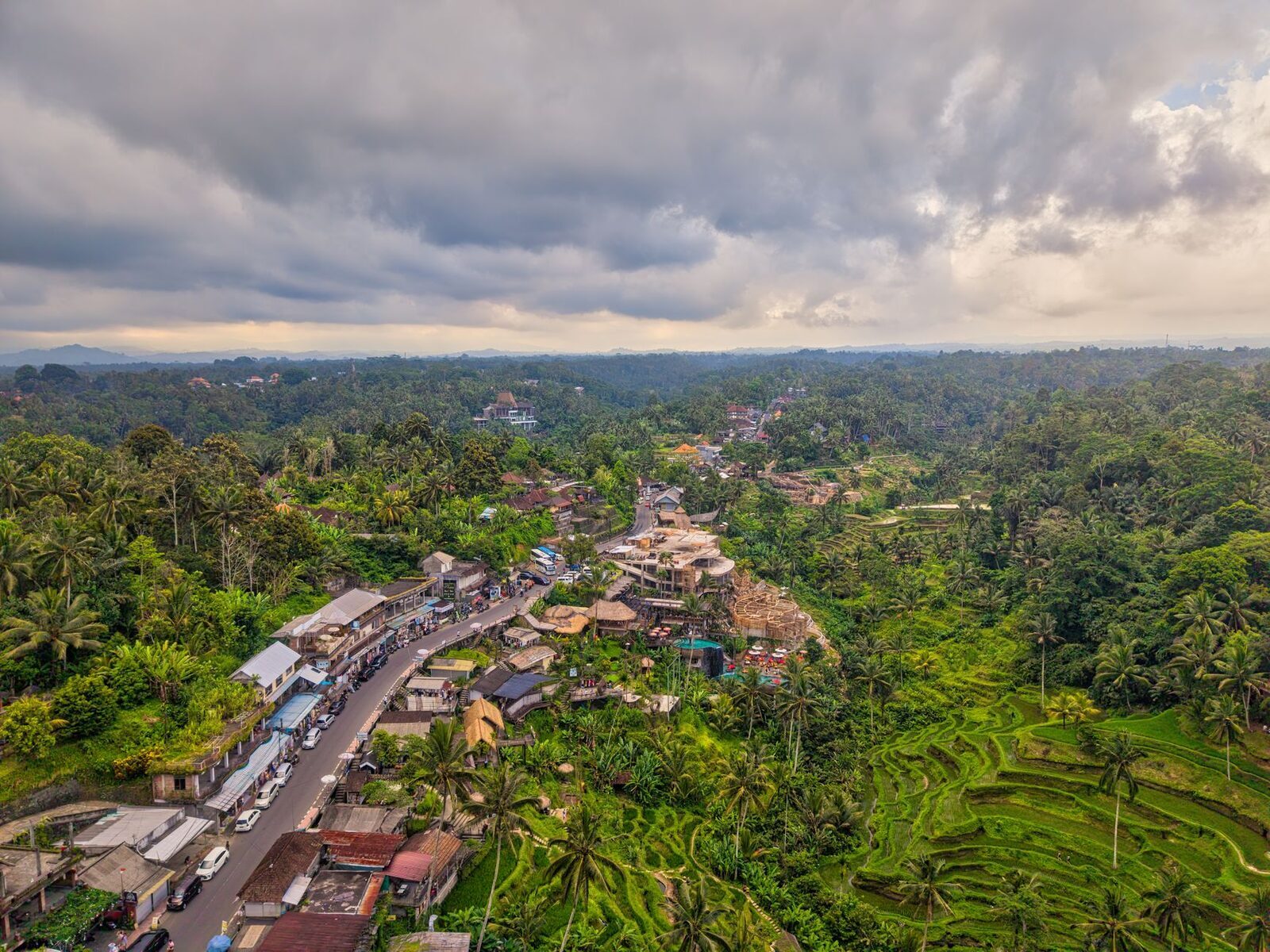 The ridge and the Ubud rooftops it overlooks — minutes from town, which is why the walk back in the dark is short but unlit.