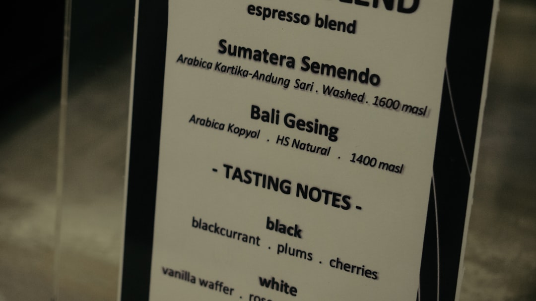 A café menu board of Indonesian coffee origins and tasting notes