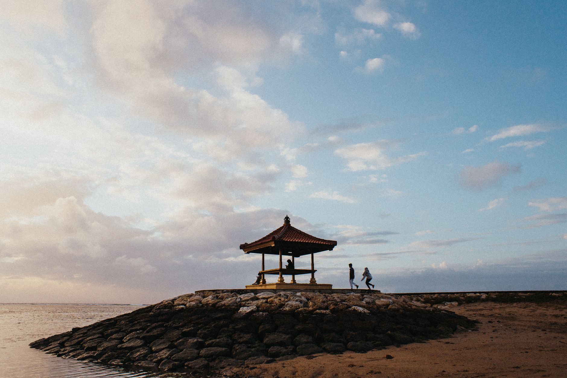 A seaside gazebo over the calm water at Sanur