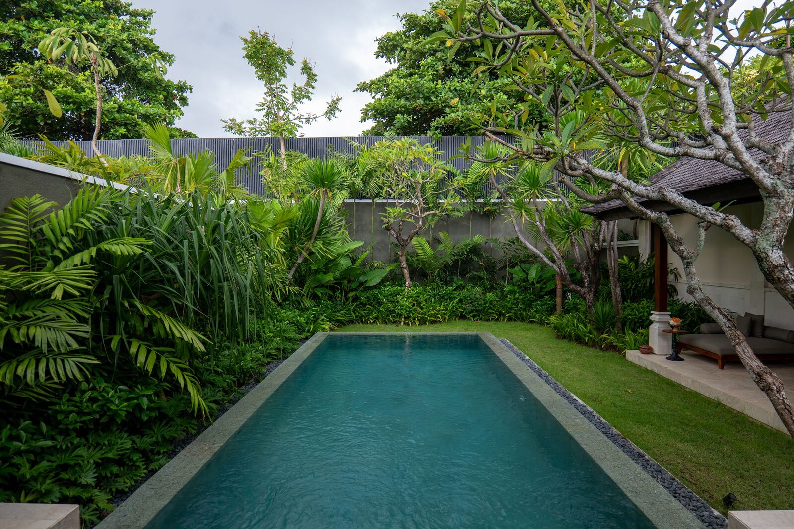 A lush garden villa and pool — the version that eats a Western-sized budget.