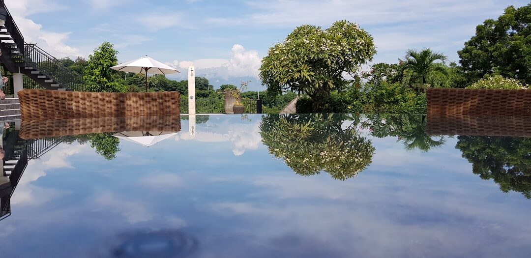 An infinity pool giving back the sky.
