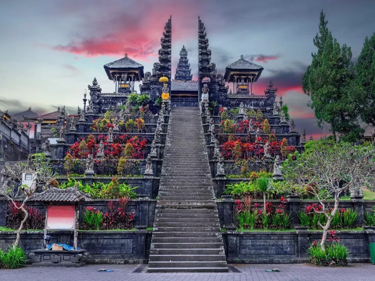 Besakih, the Mother Temple — the great stairway climbing to the split gate on Agung's slopes, Bali's holiest and largest complex.