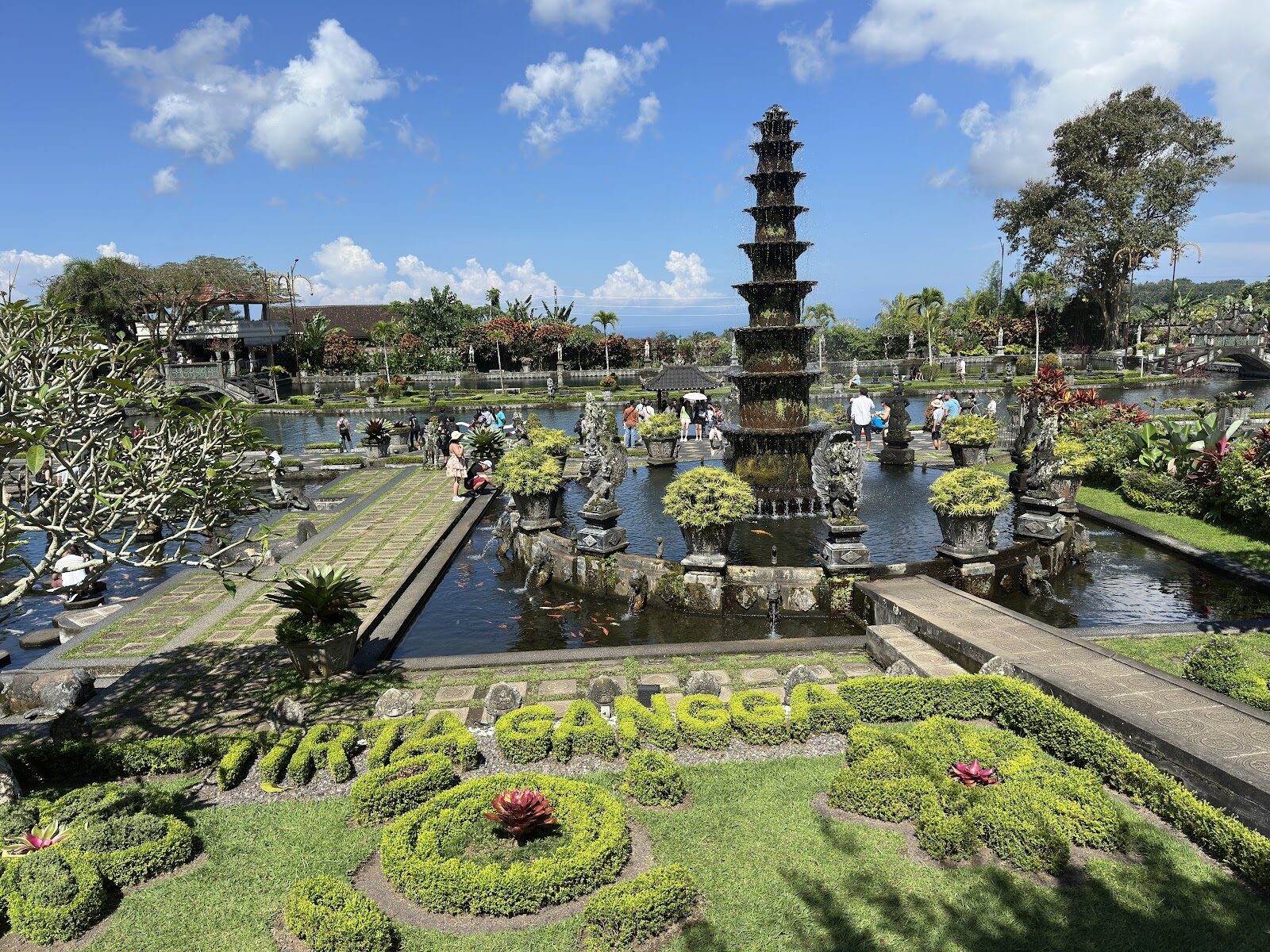 The clipped gardens and pools of the water palace.