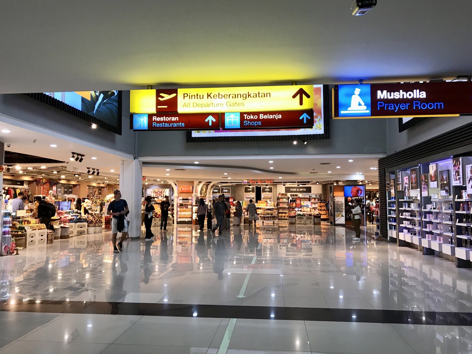 The airport concourse — where a pre-booked pickup means you walk straight past the arrivals-hall hustle.