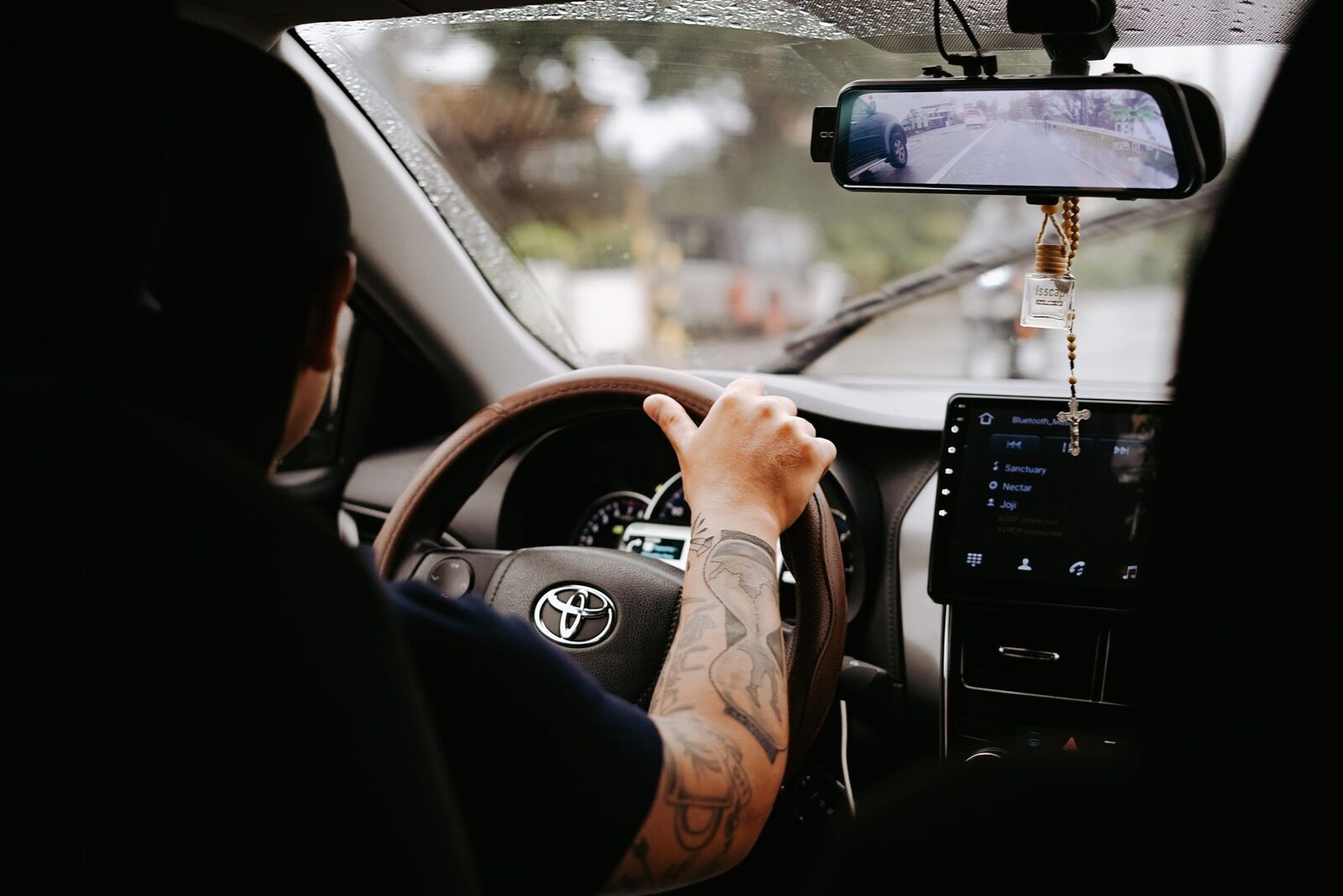 Hands on the wheel, the driver doing all the navigating and parking you'd otherwise dread.