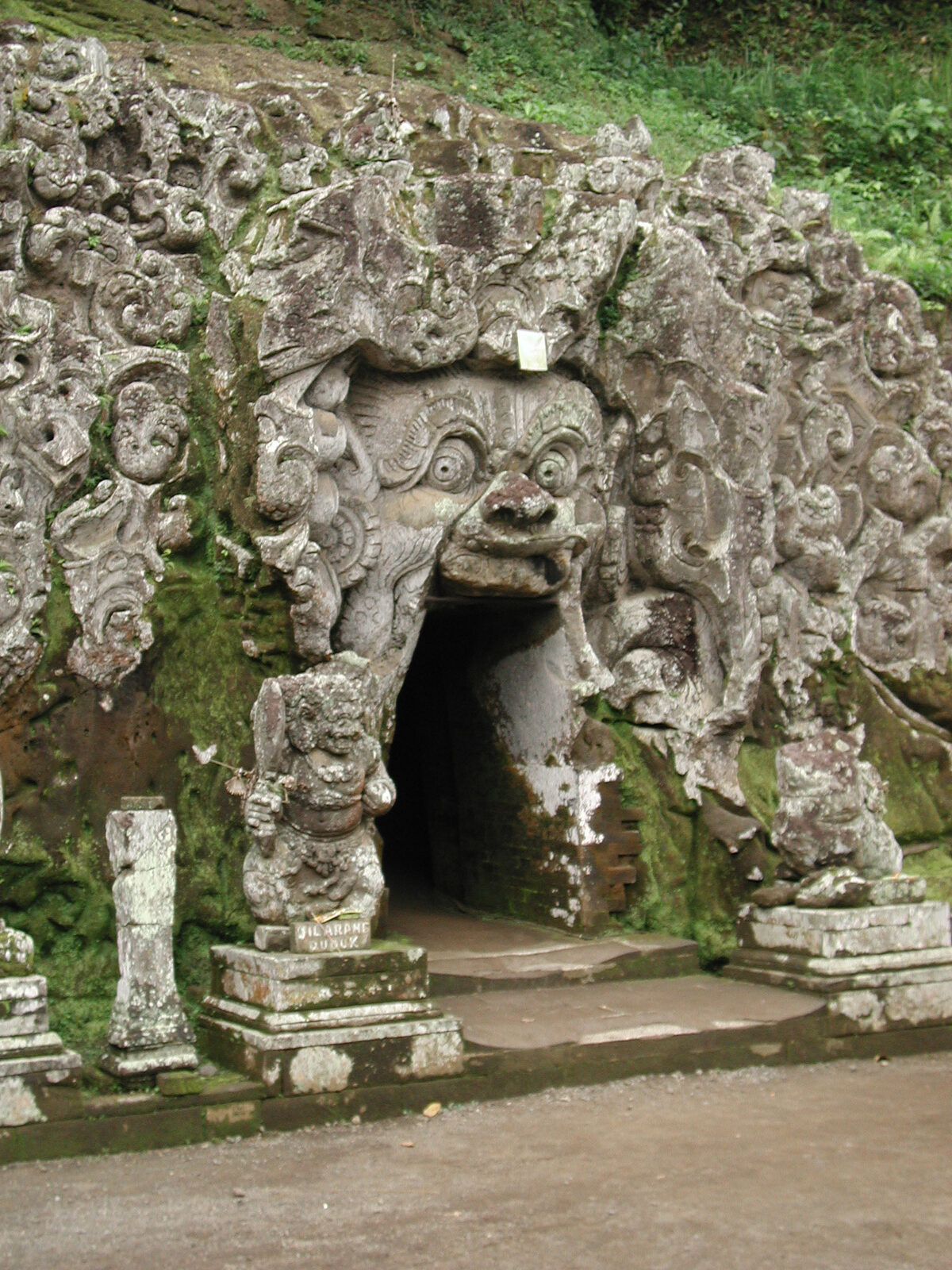 The mossy cave mouth head-on — smaller in person than the photos suggest.