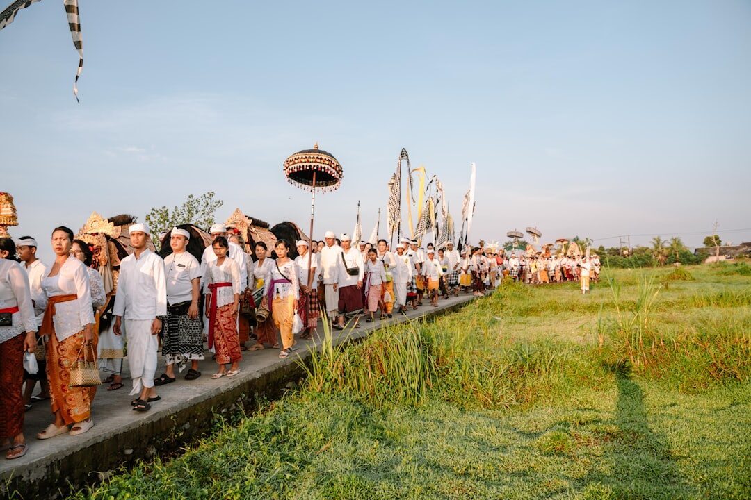 A Balinese temple procession elsewhere on the island — when a ceremony is on, worshippers come first and the photo line pauses.