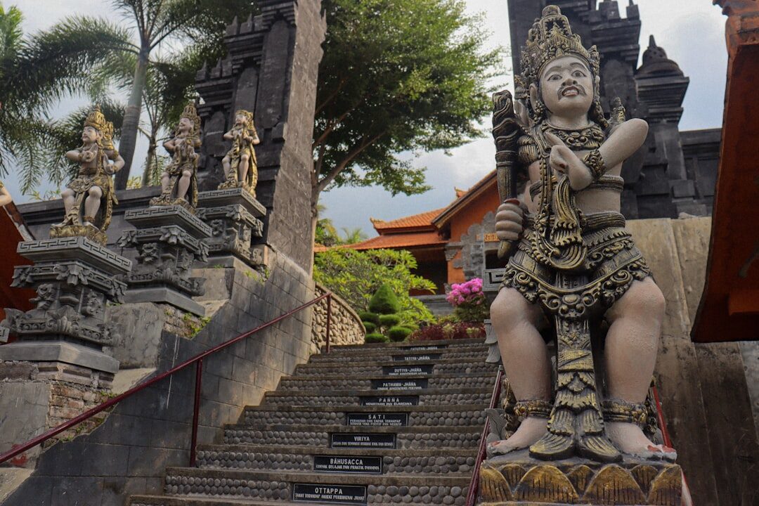 Stone guardian figures stand watch over one of the stairways.