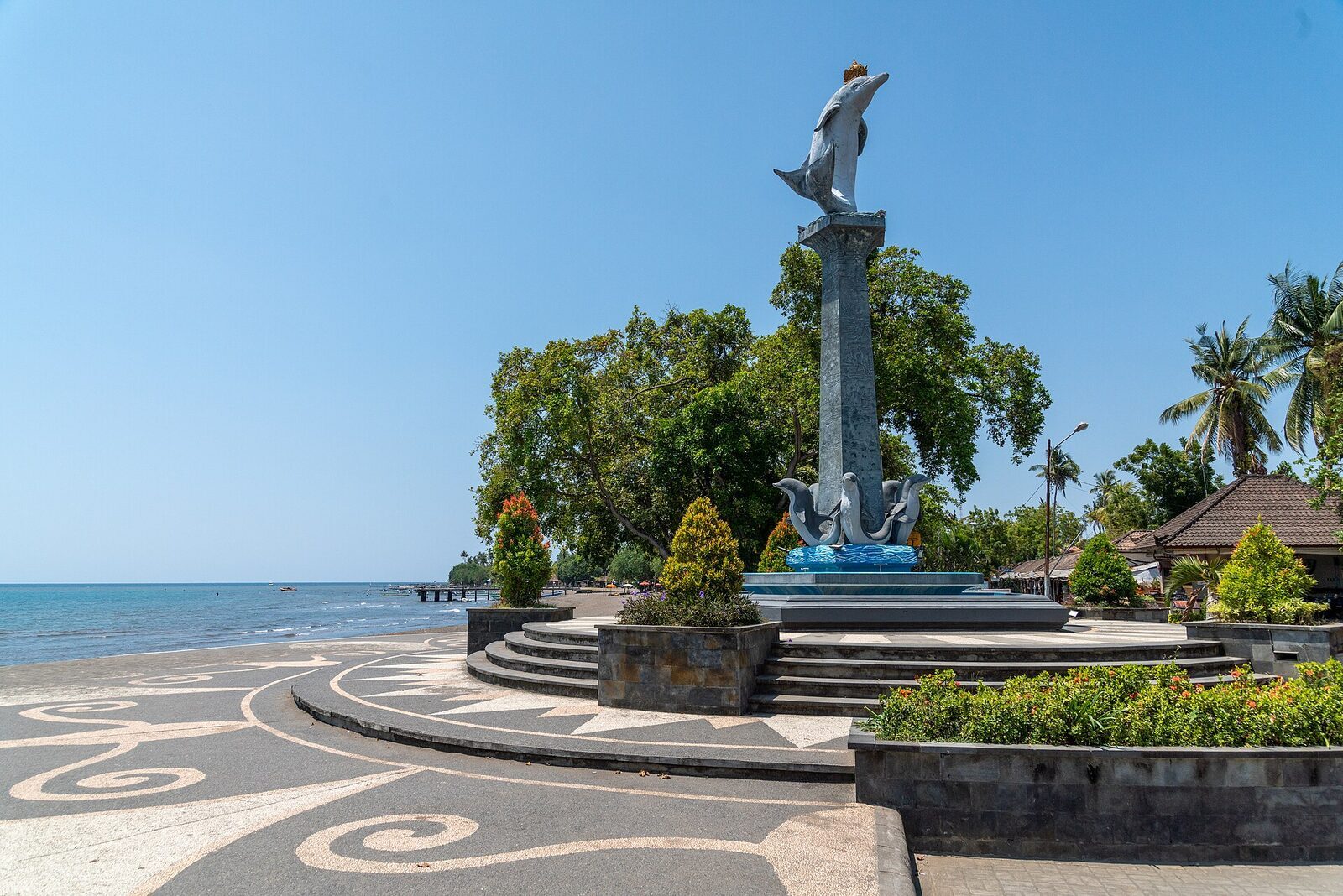 Lovina's landmark dolphin statue — the town's unofficial symbol, and a nod to what everyone comes for.