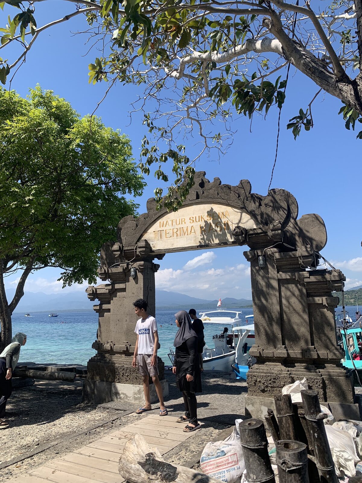 The stone gate on Menjangan Island — the landmark you moor near before dropping in.