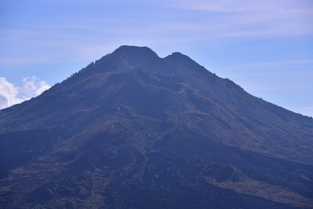 The bare symmetrical cone against a clear sky.