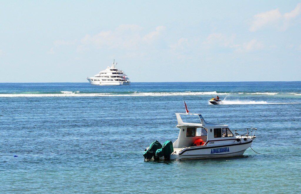 The speedboats that run the parasailing, tubing and turtle-island trips, moored off the strip.