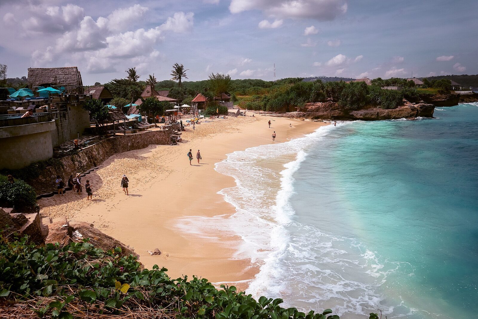 Dream Beach on Nusa Lembongan — a compact stretch of white sand and rolling surf, the mellow half of the Nusas.