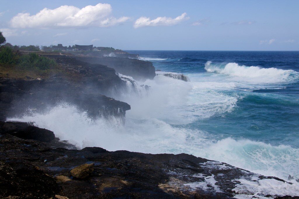 Swells slamming the black-rock cliffs — this is the water that sweeps people off.
