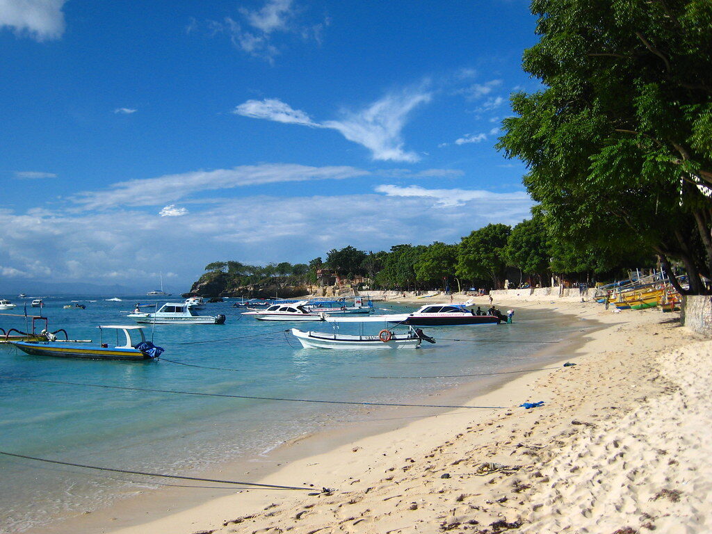 Boats moored off Lembongan's main beach, the island's turquoise fringe.