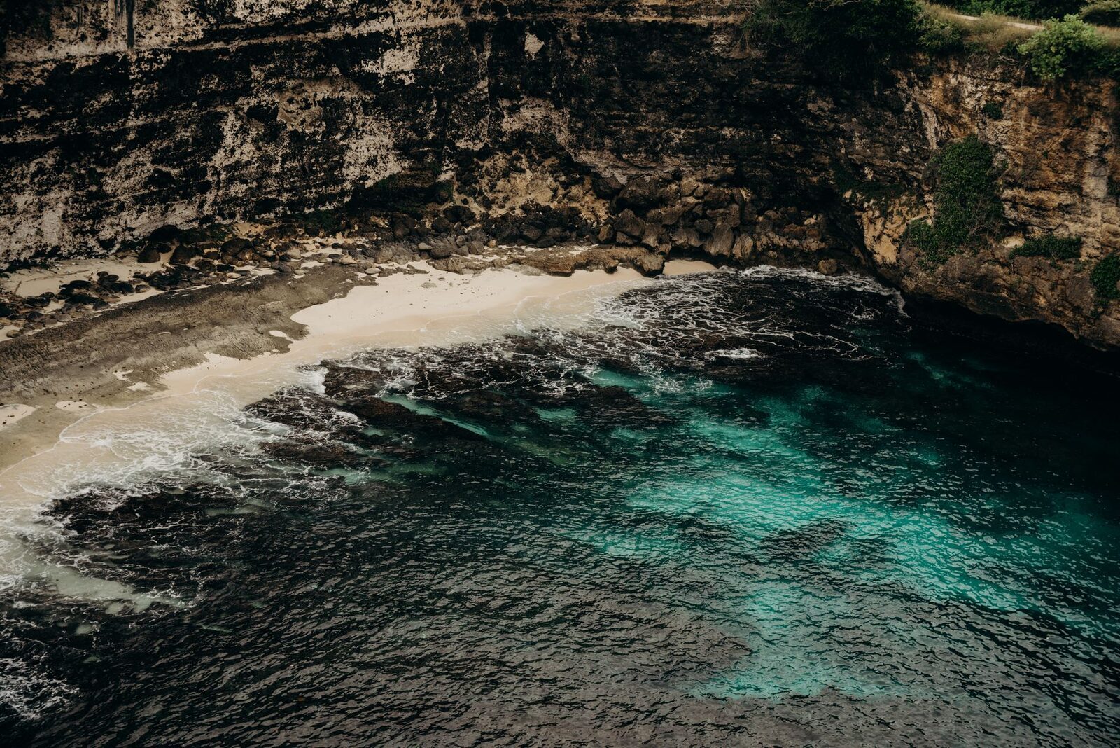 The Blue Lagoon cove — beautiful, and higher above the water than it looks from the platform.