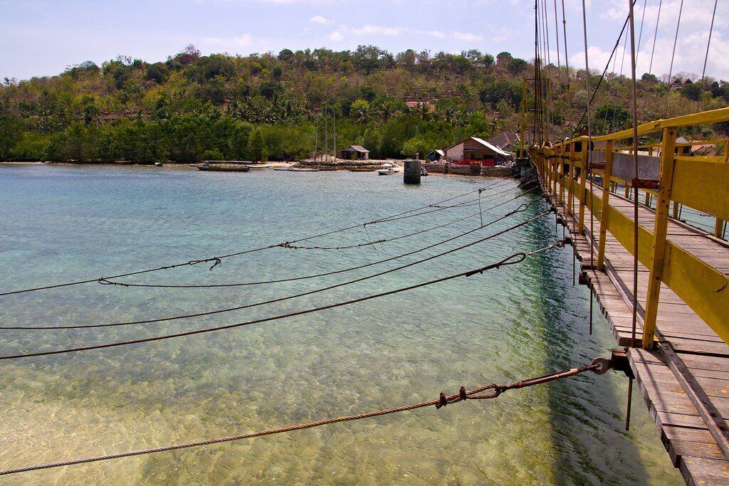 The Yellow Bridge from the side, spanning the seaweed-farmed channel between the islands.