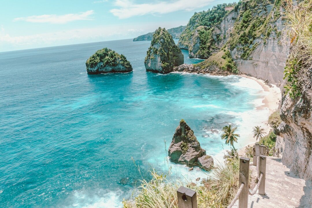 The Diamond Beach cove and its carved cliff stairway down from the top.