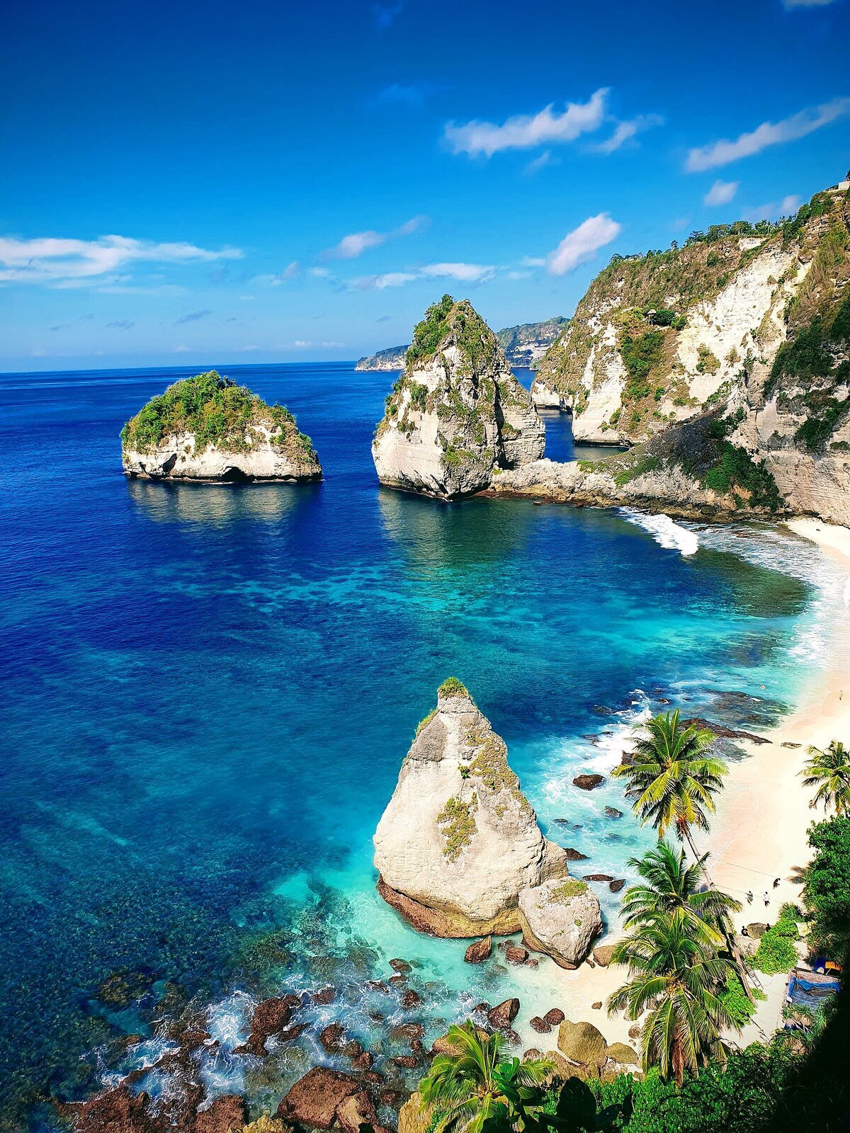 Sea stacks rising from the turquoise water off the east coast.