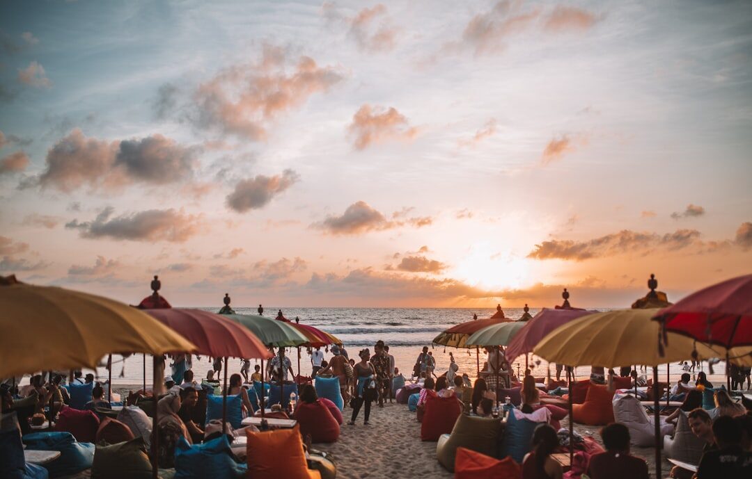 Sunset from a beach warung — beanbags on the sand, the best seats on the peninsula.