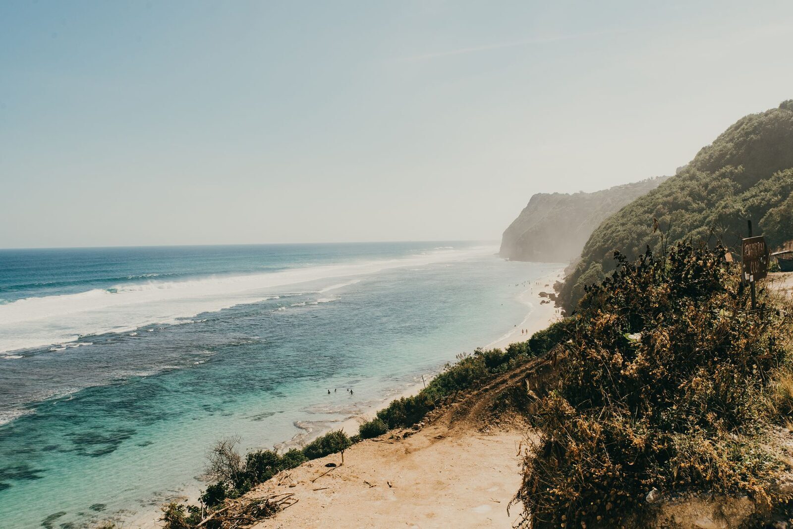 The wide, cliff-backed sweep of beach — big, exposed, and quiet.