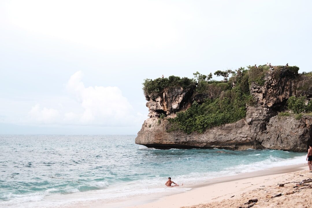 Calm water and a rock headland — the easiest paddle of the group.