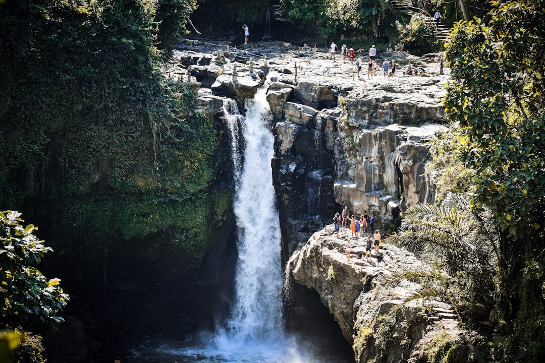 The boulder-strewn base — you pick across rocks and, after rain, wade through the shallows.