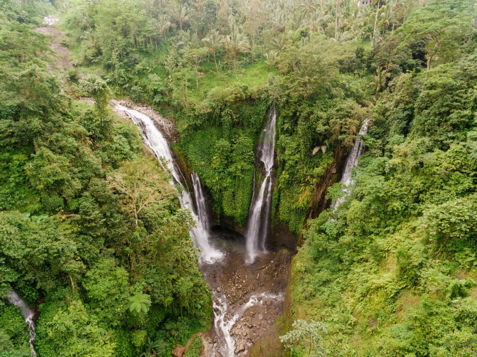 From above, falls drop through the folds of the north-Bali gorge.