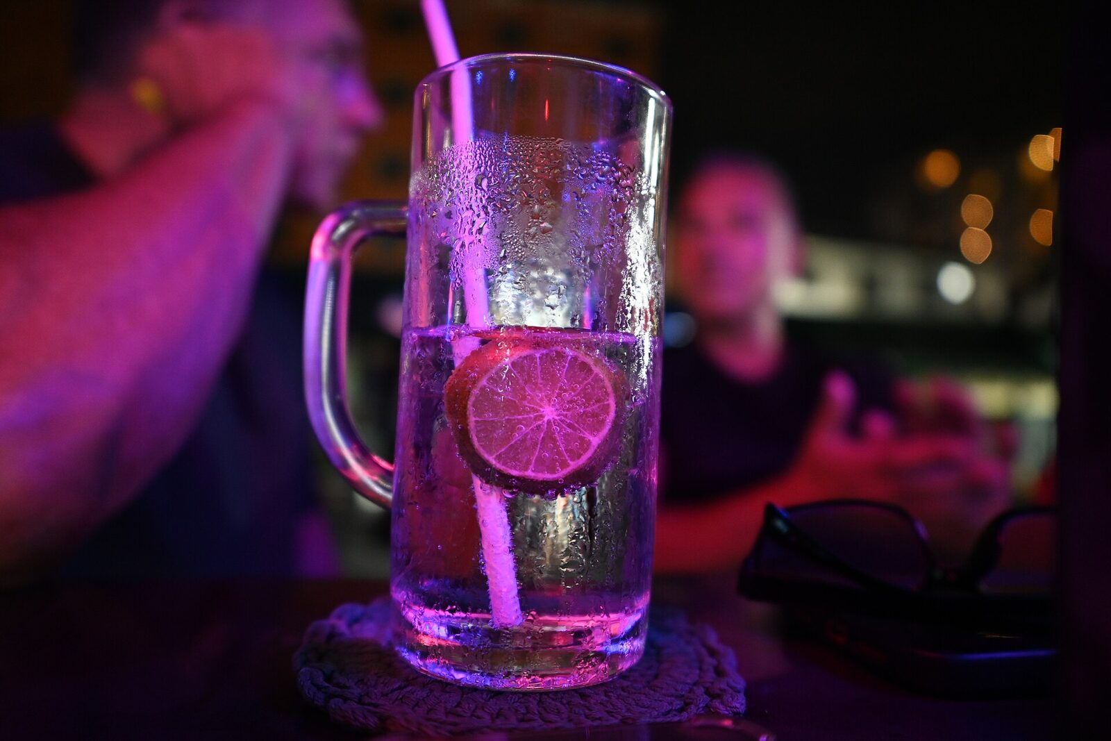 A cold one under the bar's neon.