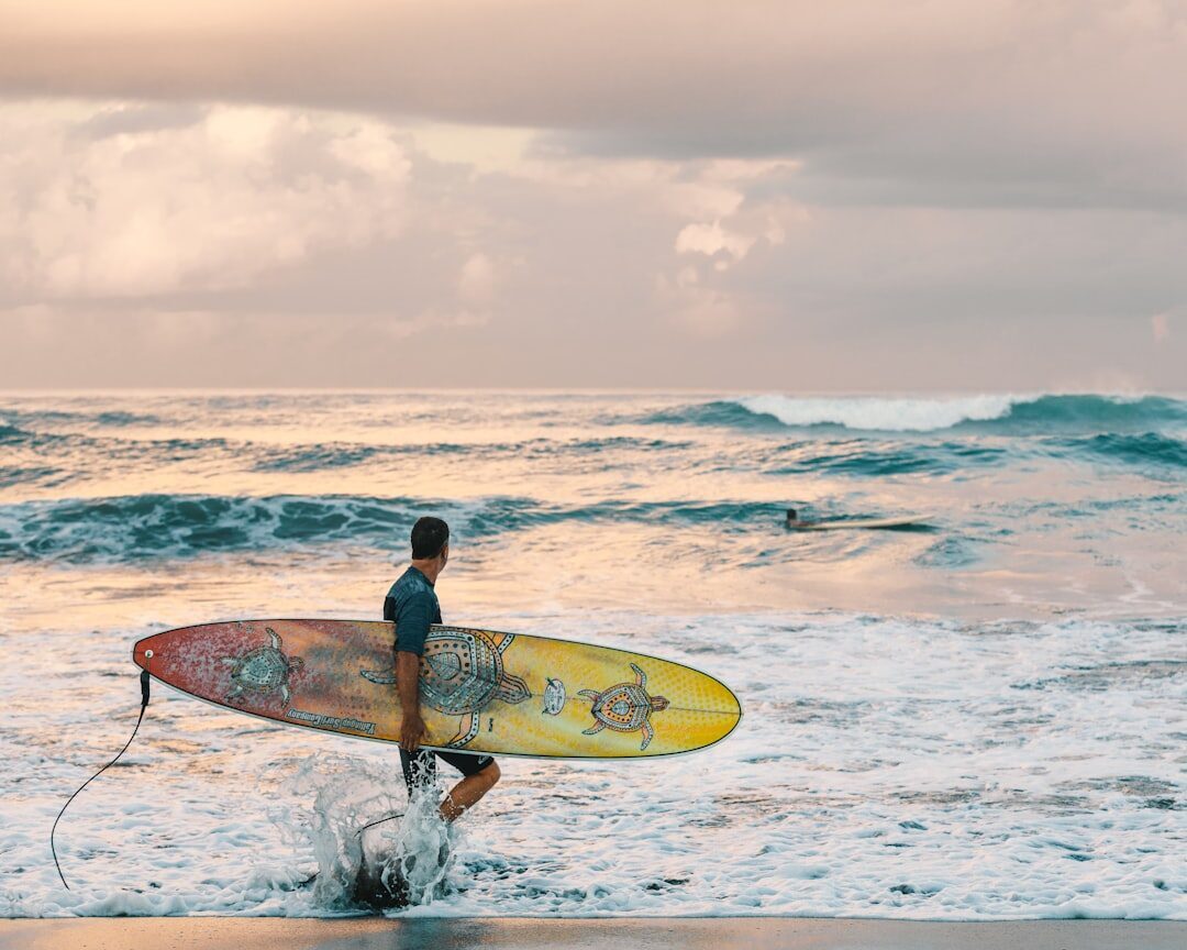 Heading out with a rented soft-top, the boards you'll start on before you ever touch reef.