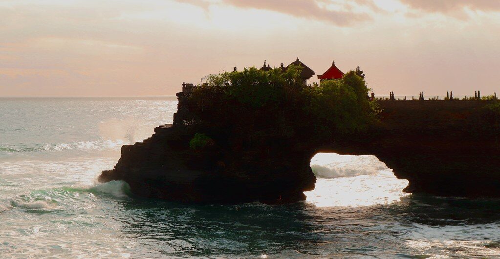Warm afternoon light on the Batu Bolong arch.