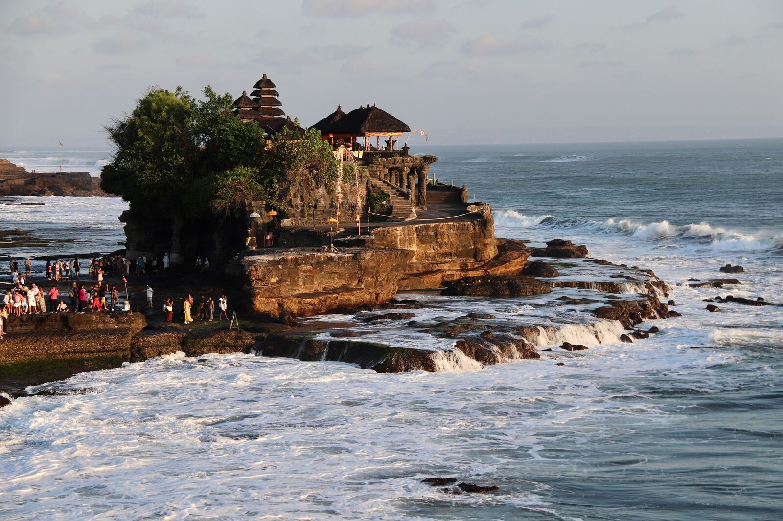 The rock causeway to the temple base, uncovered by the retreating tide.