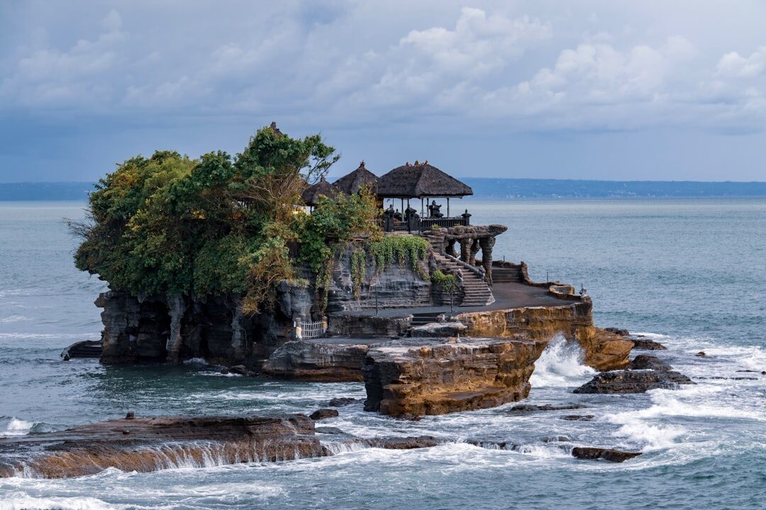 Tanah Lot's pagoda-topped rock from the northern shore.