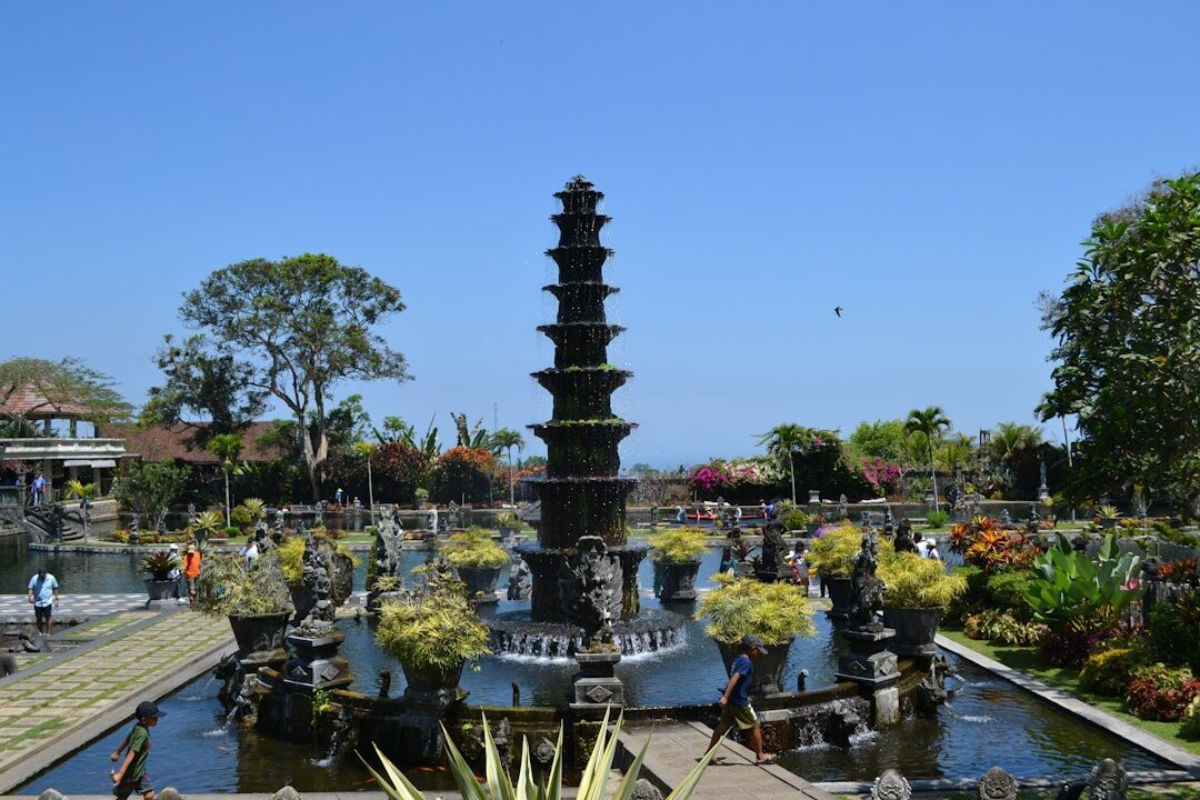 The main tiered fountain ringed by plants and ponds.