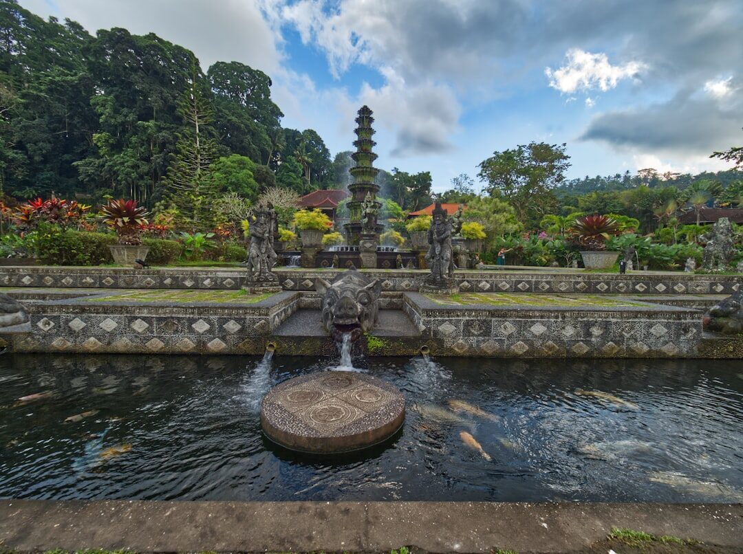 The lower koi ponds and carved fountains — the part everyone photographs. The two spring-fed swimming pools are a separate, plainer terrace nearby.