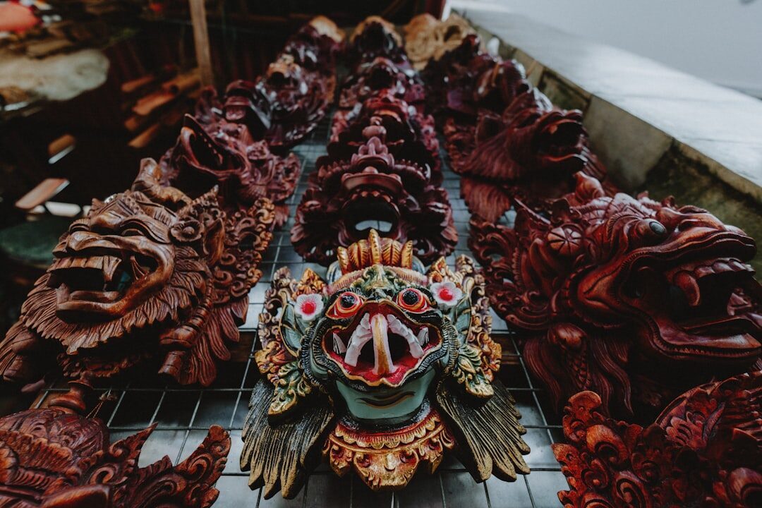 A carved wooden Barong mask — the kind of woodwork Ubud's craft villages are known for.