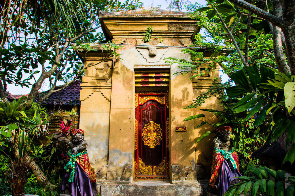 A shrine gate dressed with offerings inside the palace grounds.