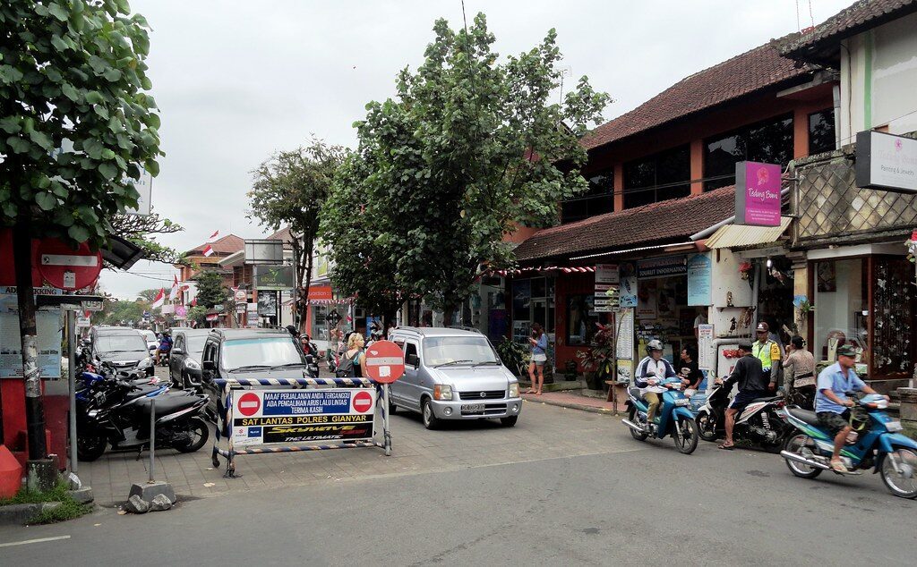 Central Ubud's main street — the cluster of villages that grew together around the palace, shops and scooters and all.